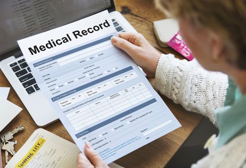 Should I release my medical records to another driver's insurance adjuster?