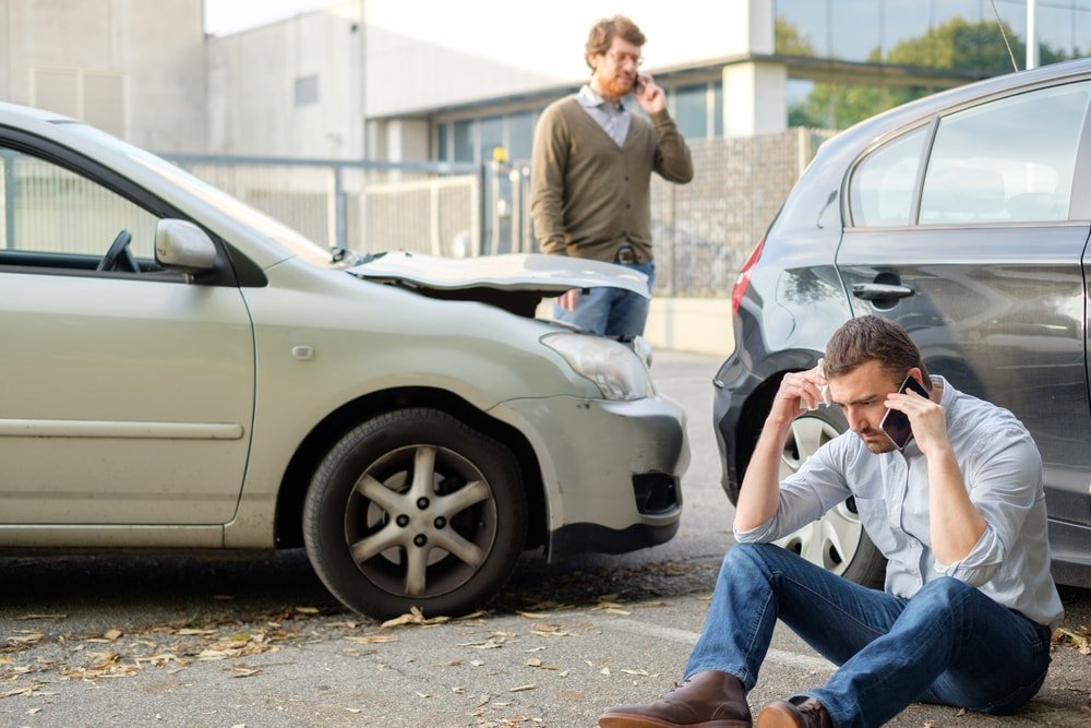 Two drivers arguing whose at fault at the accident.