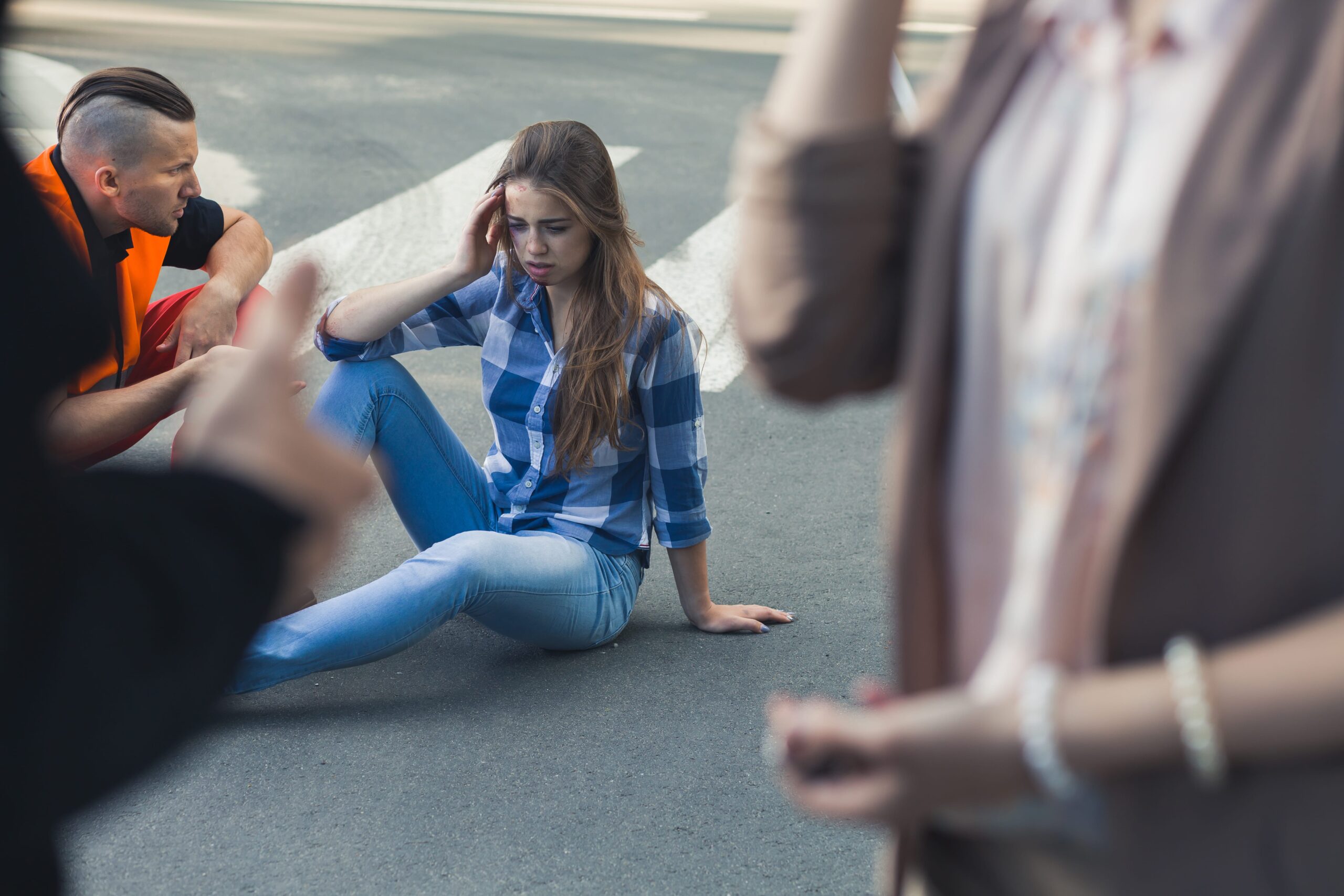 Woman got headache, sign of concussion from the car crash.