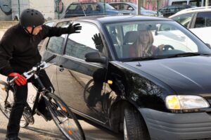 A mans bike accident with a car