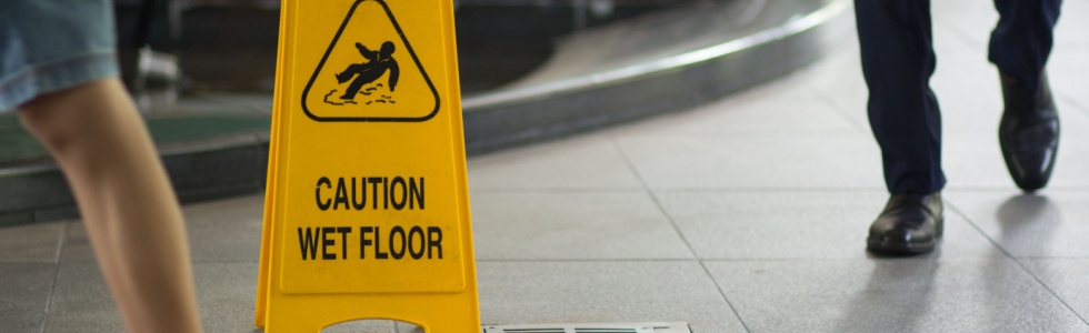 wet floor slip and fall warning sign