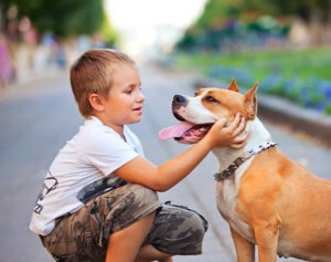 child with dog